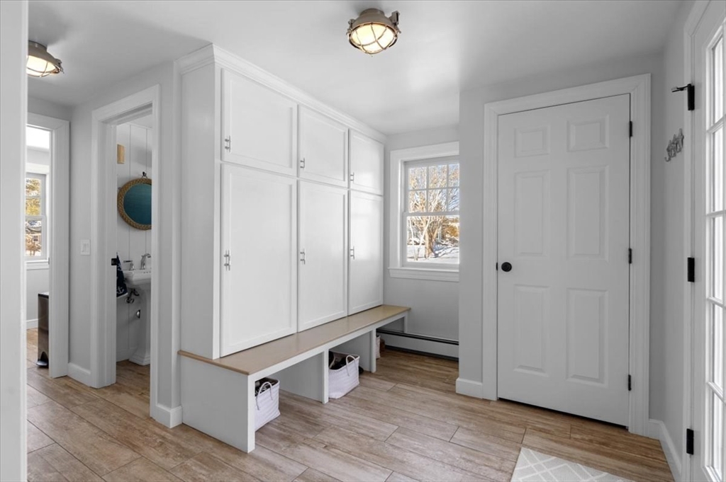 8 Village Lane Hingham, MA 02043 - Photo 19 of 36 a view of kitchen with stainless steel appliances cabinets and wooden floor