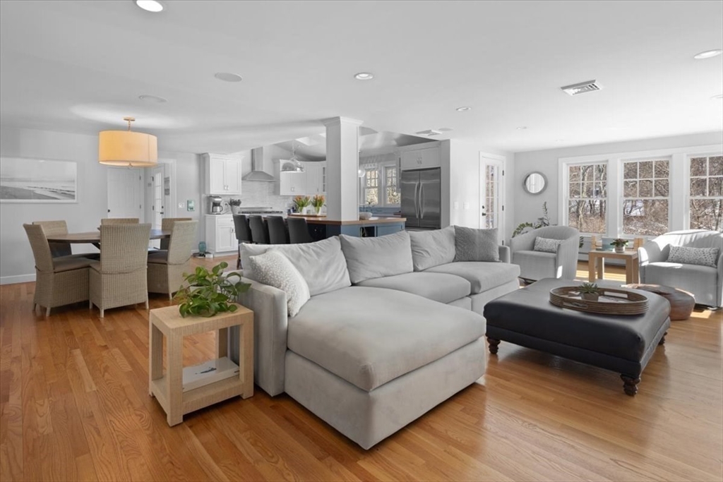 8 Village Lane Hingham, MA 02043 - Photo 2 of 36 a living room with furniture and a large window