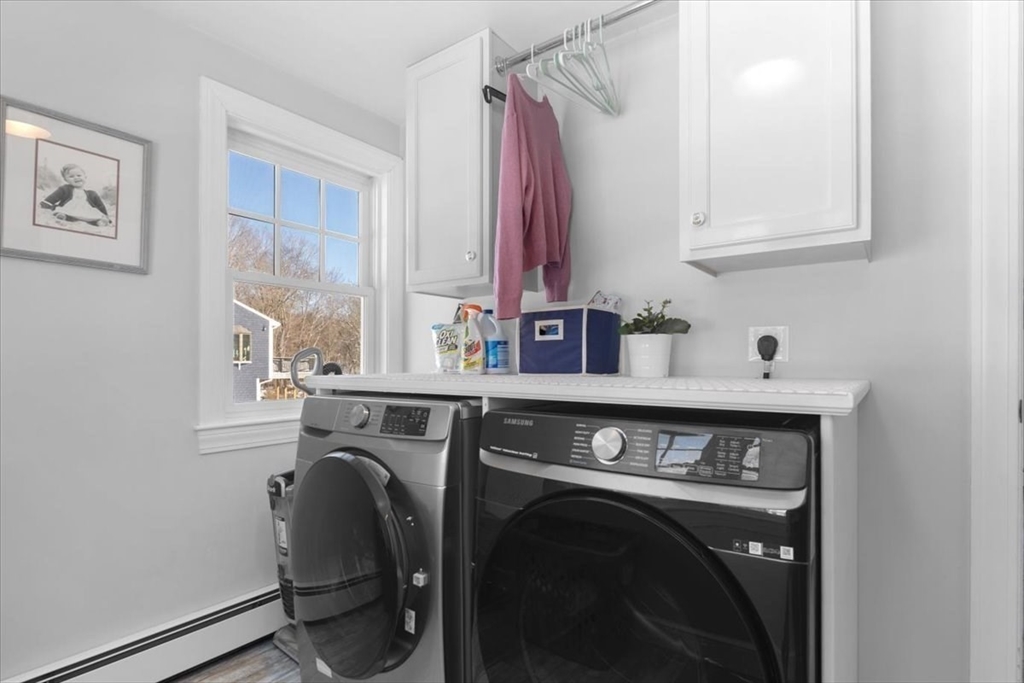 8 Village Lane Hingham, MA 02043 - Photo 21 of 36 a utility room with dryer and washer