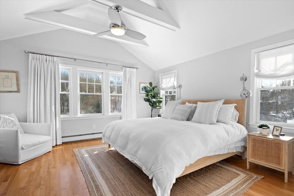 8 Village Lane Hingham, MA 02043 - Photo 22 of 36 a bedroom with a large bed and windows