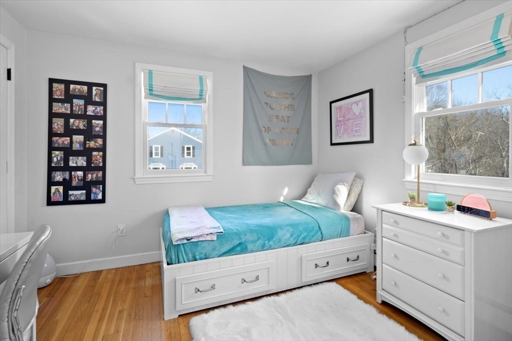 8 Village Lane Hingham, MA 02043 - Photo 28 of 36 a bedroom with a bed and a window