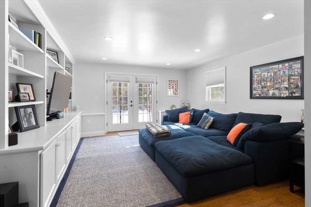 8 Village Lane Hingham, MA 02043 - Photo 30 of 36 a living room with furniture and a rug