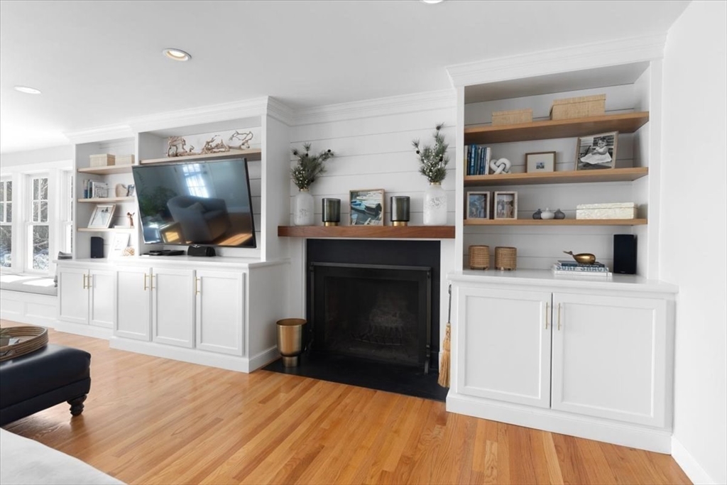 8 Village Lane Hingham, MA 02043 - Photo 4 of 36 a living room with furniture and a flat screen tv