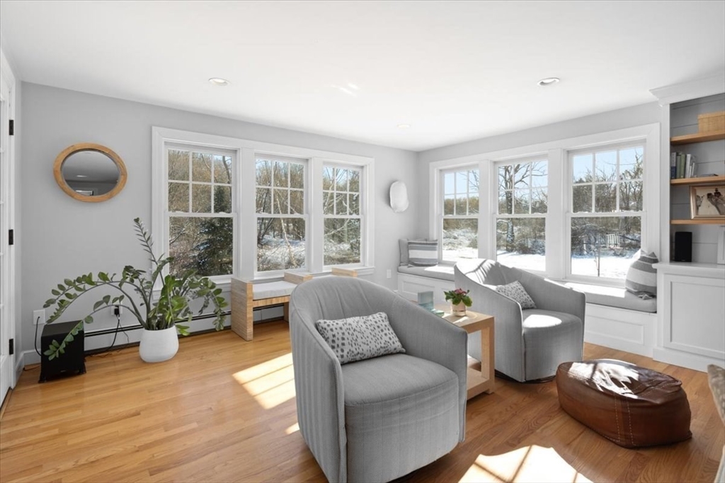 8 Village Lane Hingham, MA 02043 - Photo 5 of 36 a living room with furniture and a large window