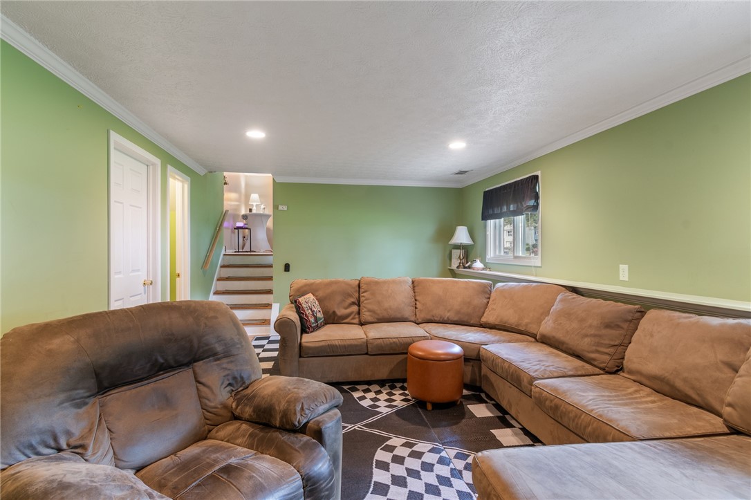 64 Elmford Road Gates, NY 14606 - Photo 16 of 37 The lower level GATHERING space! So much EXTRA roo