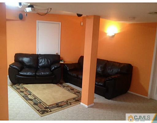 179 Salem Road North Brunswick, NJ 08902 - Photo 10 of 23 a living room with furniture