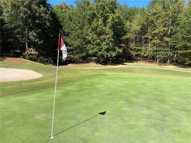 a view of a field with an outdoor space