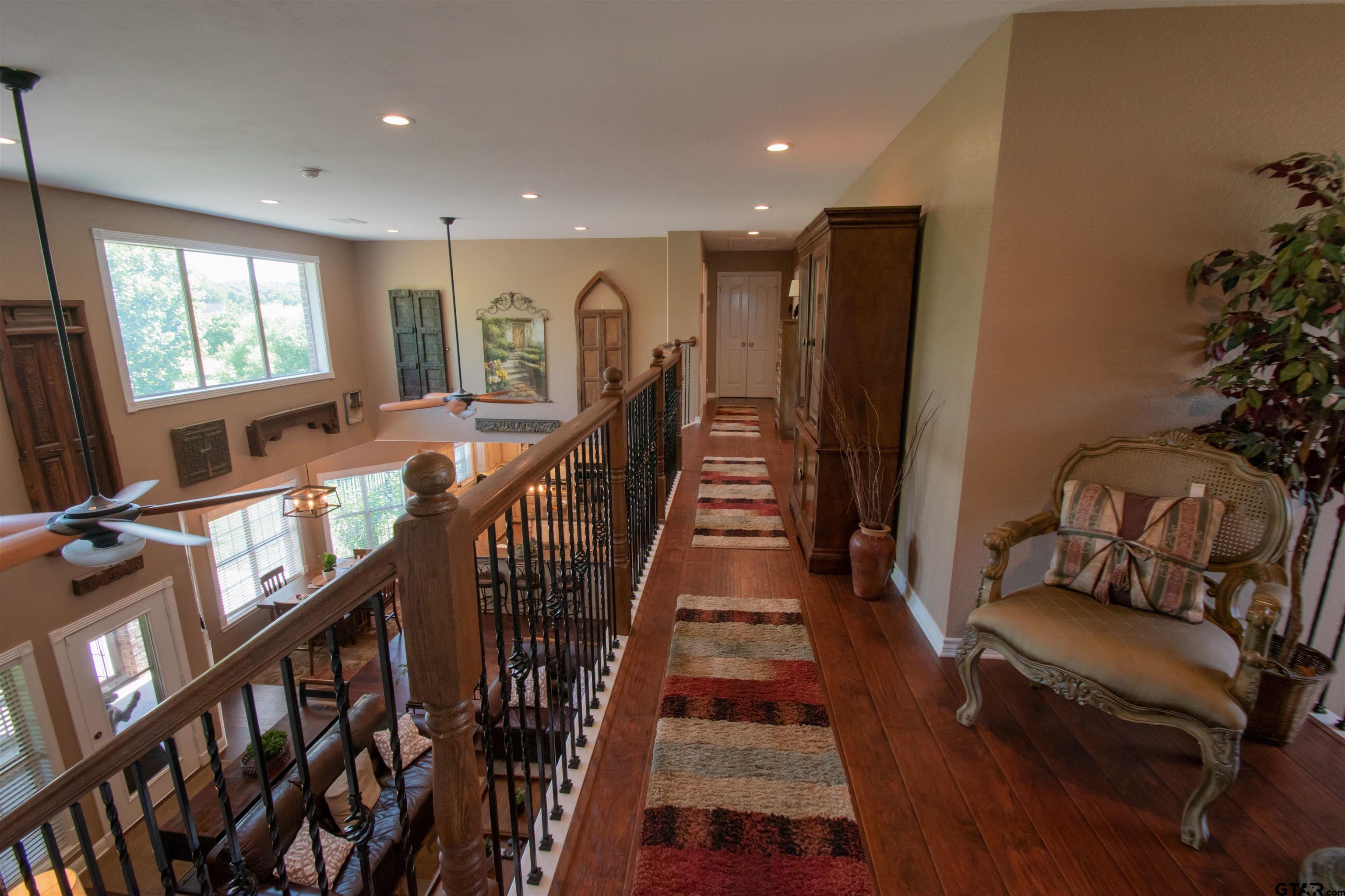 23120 Saddle Ridge Court Lindale, TX 75771 - Photo 17 of 34 a living room with furniture window and wooden floor