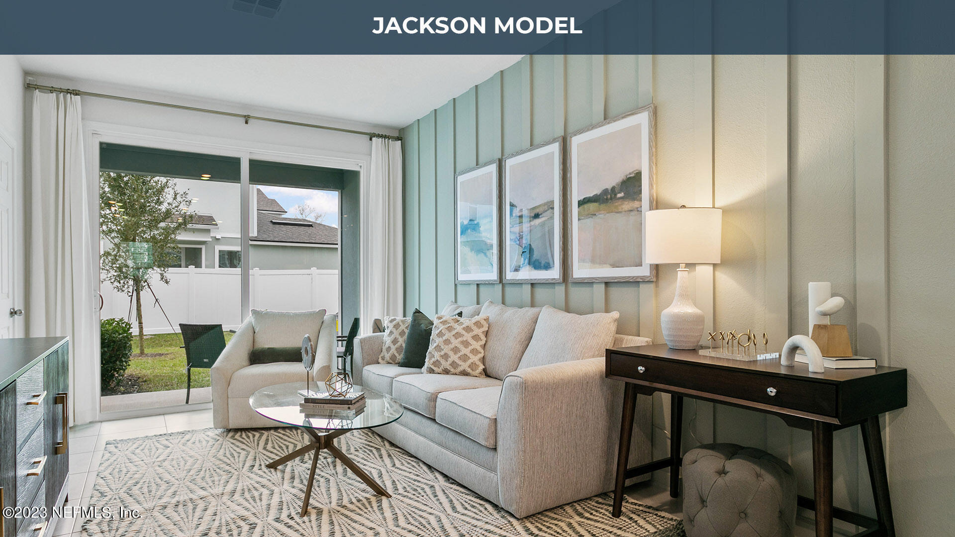 8357 Retrograde Road Jacksonville, FL 32256 - Photo 7 of 34 a living room with furniture and a window