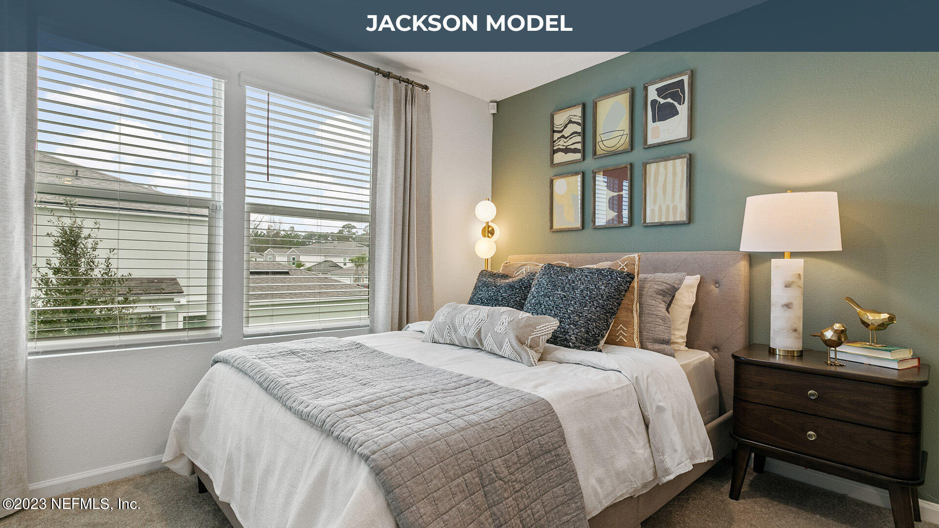 8357 Retrograde Road Jacksonville, FL 32256 - Photo 8 of 34 a bedroom with a bed and a night stand