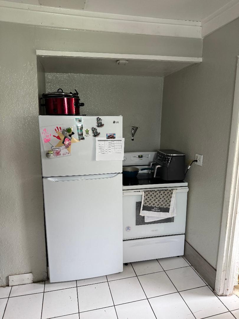511 Texas Court Fort Pierce, FL 34950 - Photo 11 of 15 a utility room with dryer and washer
