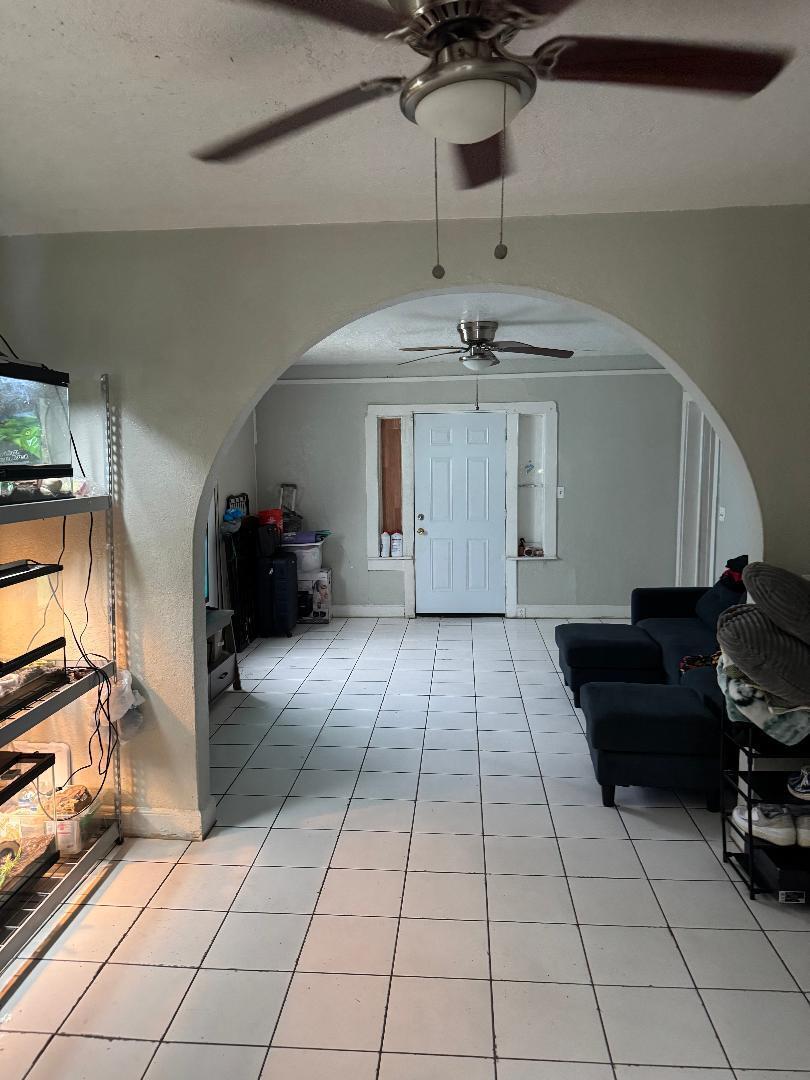 511 Texas Court Fort Pierce, FL 34950 - Photo 10 of 15 a view of a livingroom with furniture and cabinets