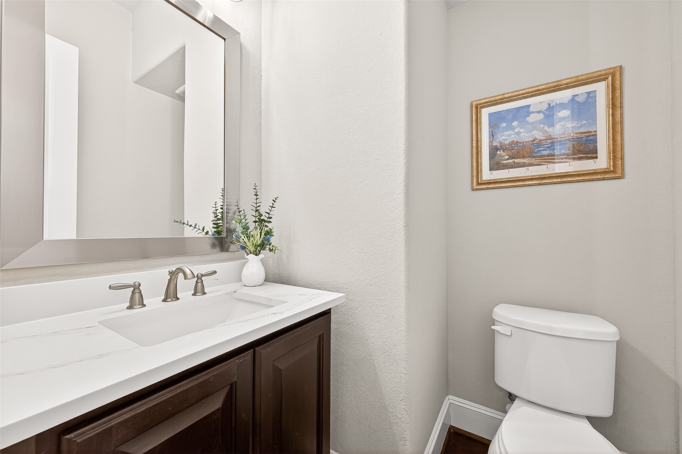 2803 Mayfield Ridge Lane Katy, TX 77494 - Photo 23 of 40 Half bath with upgraded quartz countertops and lighting