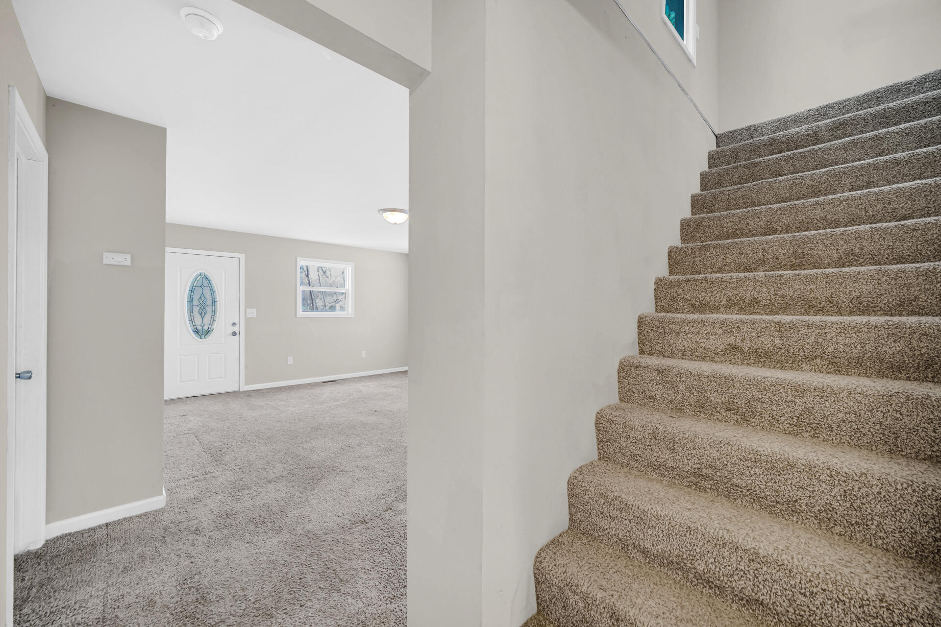 6415 West 146th Place Crown Point, IN 46307 - Photo 15 of 23 a view of staircase with white walls