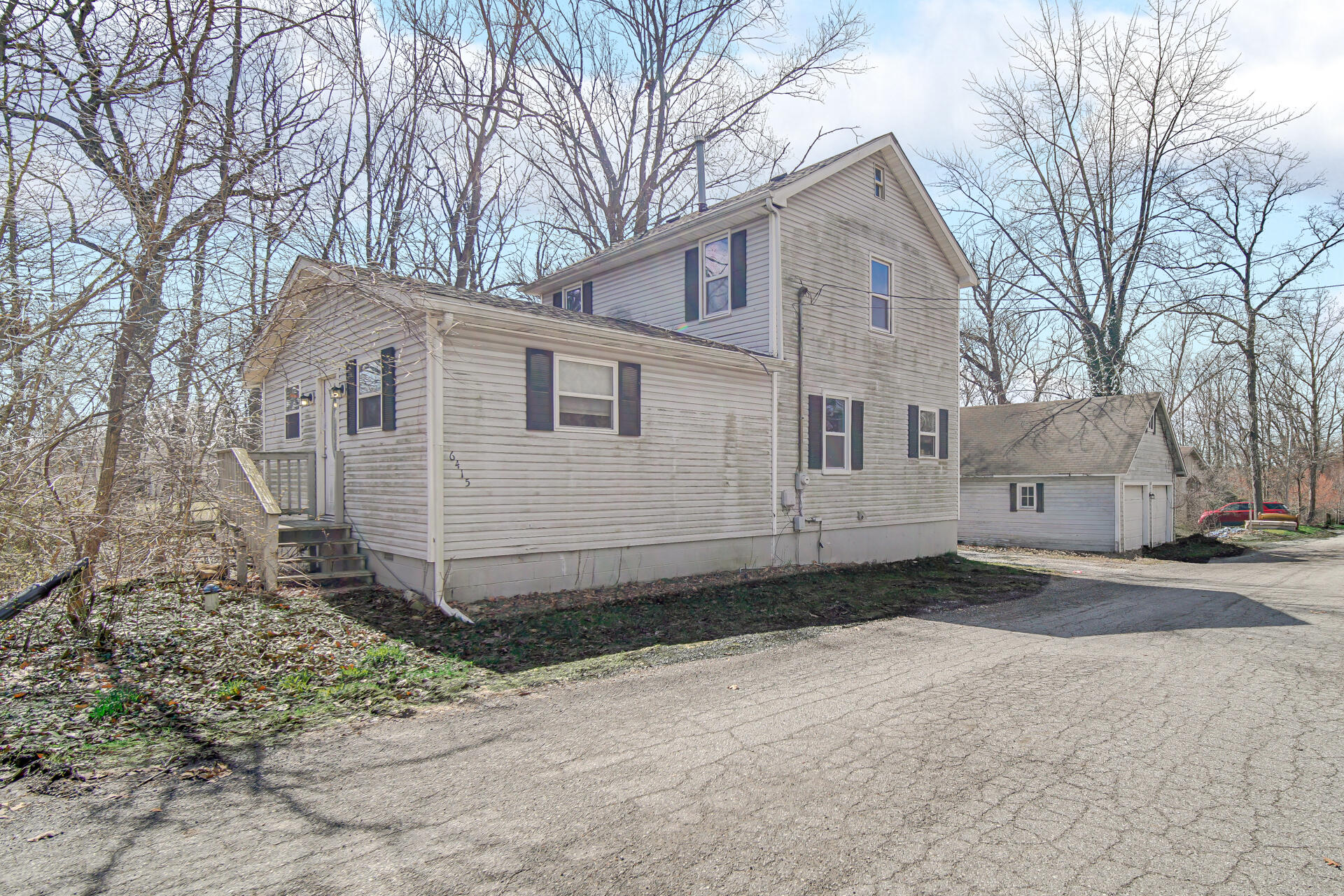 6415 West 146th Place Crown Point, IN 46307 - Photo 2 of 23 a front view of a house with a yard