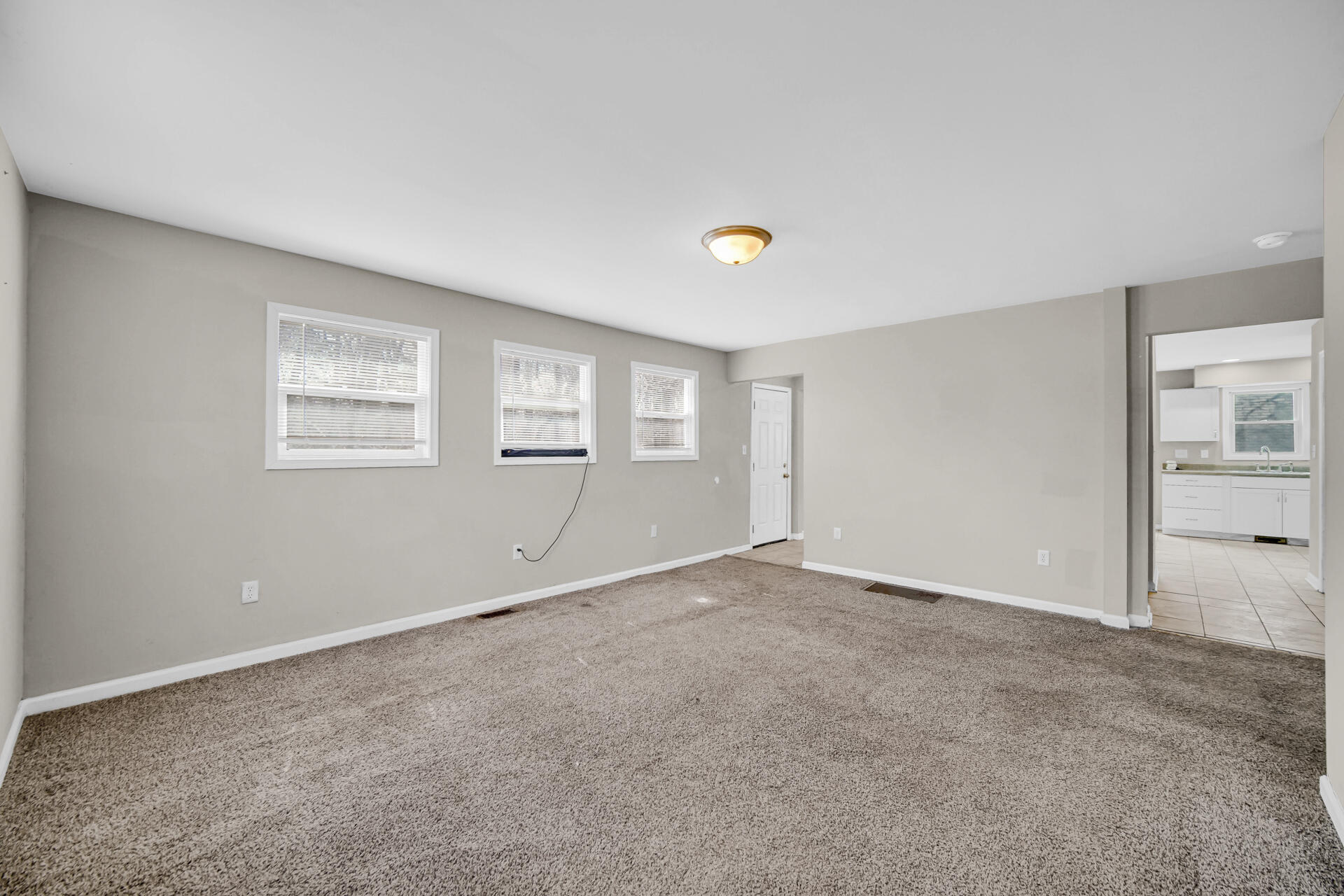 6415 West 146th Place Crown Point, IN 46307 - Photo 5 of 23 a view of an empty room with a window