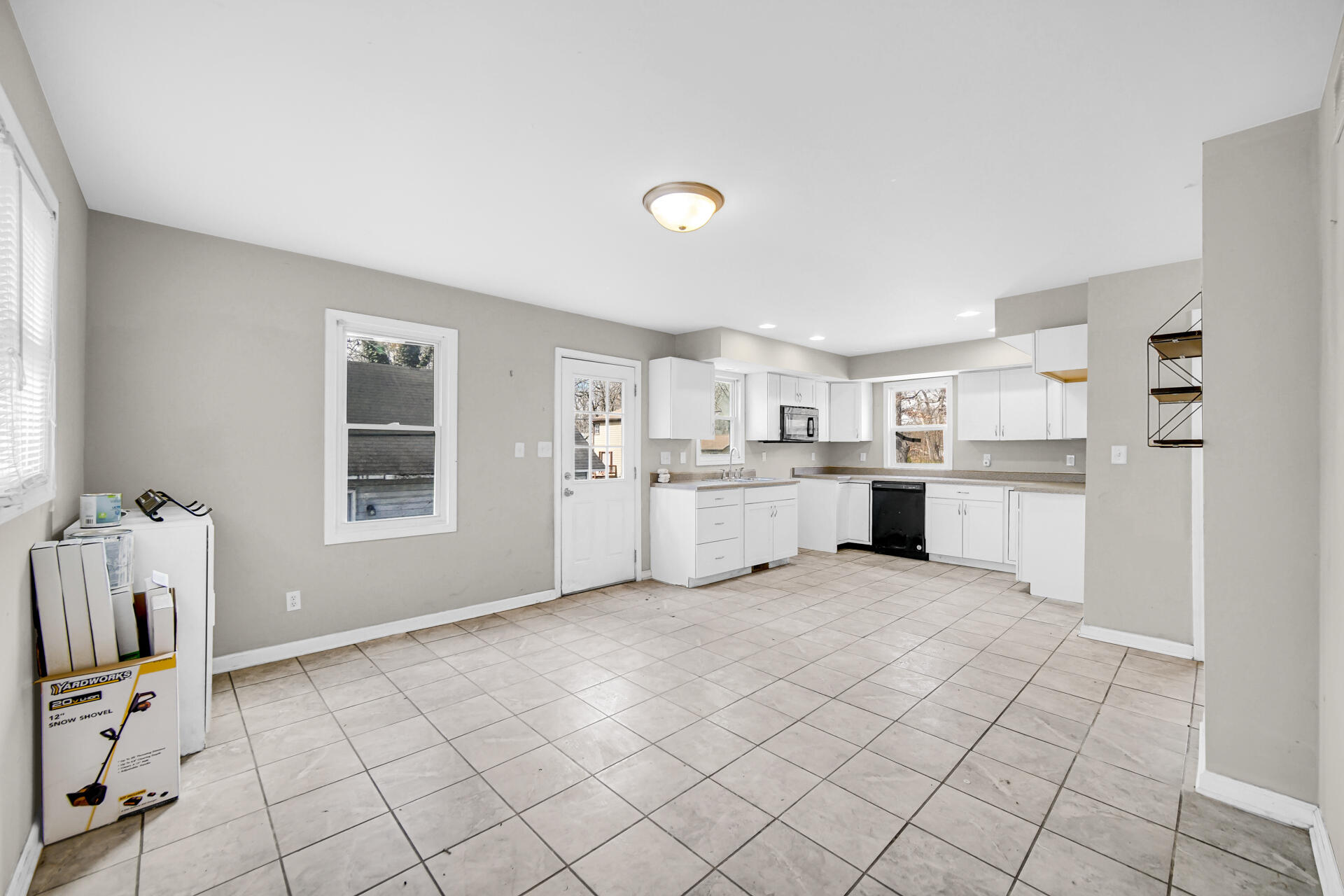 6415 West 146th Place Crown Point, IN 46307 - Photo 7 of 23 a view of a kitchen with furniture and windows