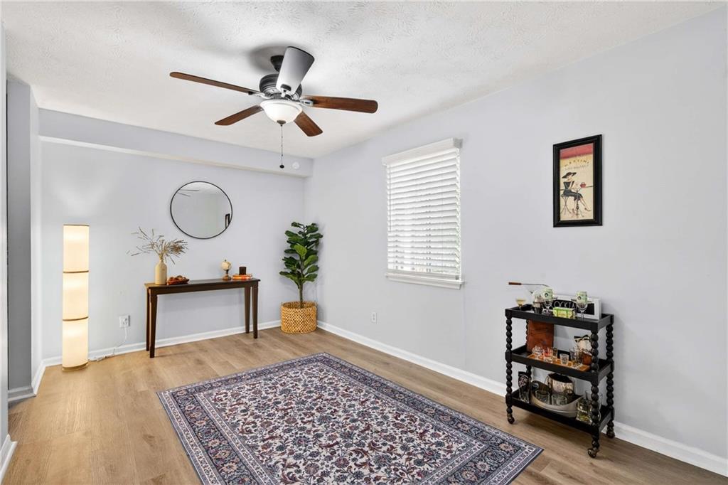 2396 Lawrenceville Highway, Unit G Decatur, GA 30033 - Photo 11 of 30 a living room with furniture and a window