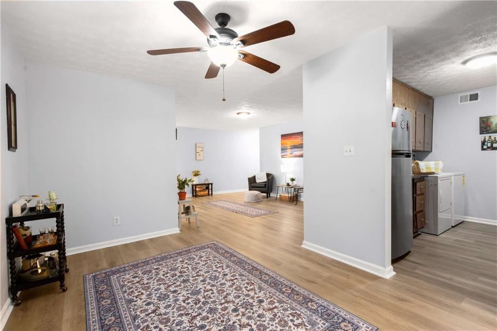 2396 Lawrenceville Highway, Unit G Decatur, GA 30033 - Photo 13 of 30 a view of a livingroom with wooden floor