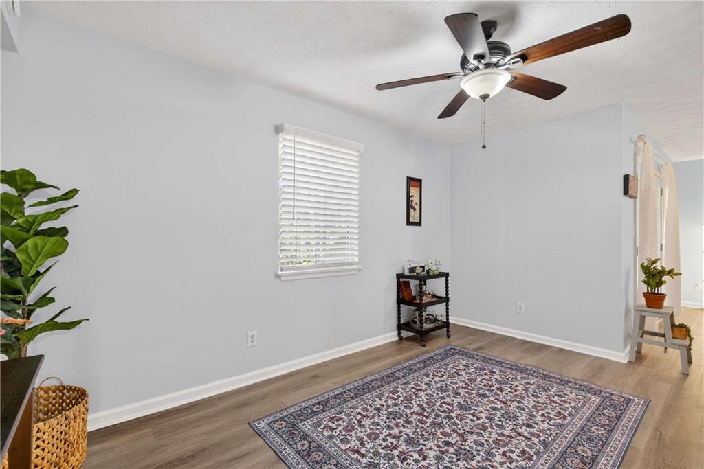 2396 Lawrenceville Highway, Unit G Decatur, GA 30033 - Photo 14 of 30 a bedroom with a bed and a window