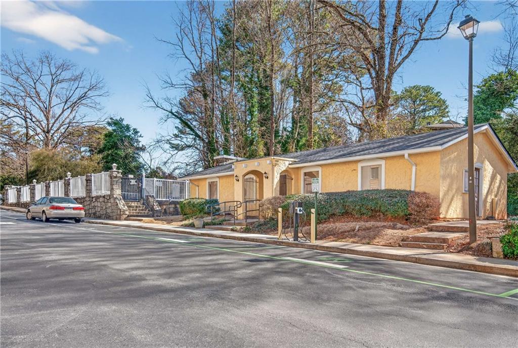 2396 Lawrenceville Highway, Unit G Decatur, GA 30033 - Photo 2 of 30 a view of a house with a large tree in front of it