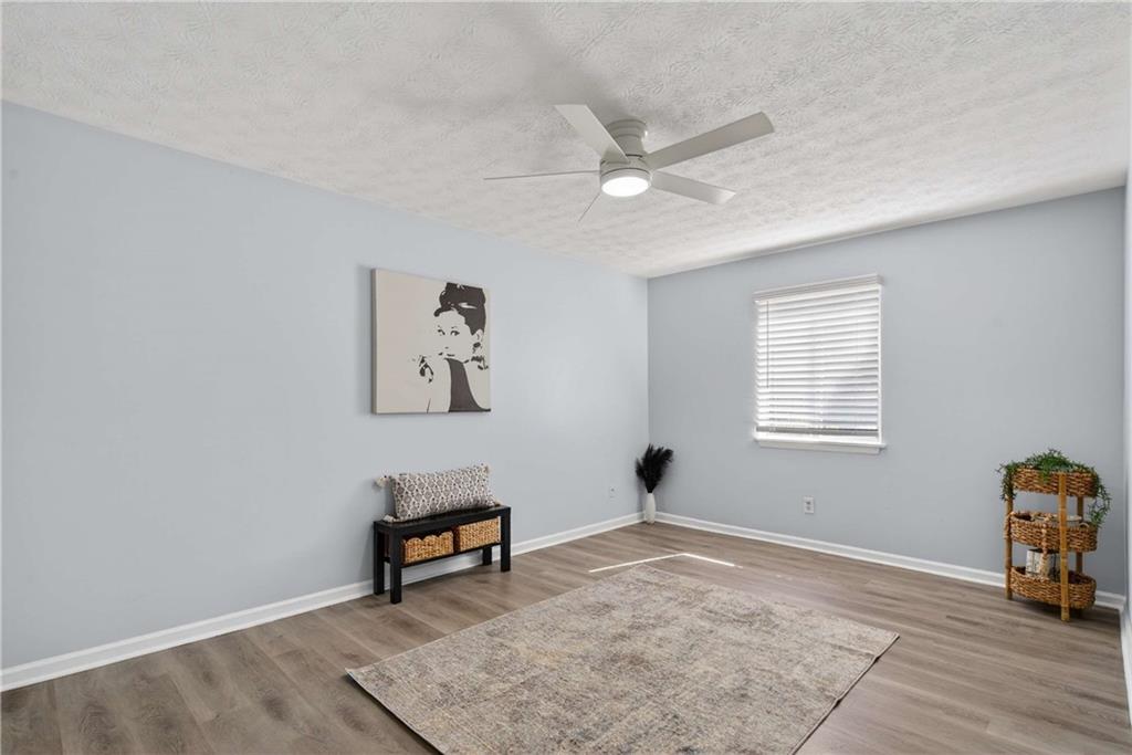 2396 Lawrenceville Highway, Unit G Decatur, GA 30033 - Photo 21 of 30 a living room with couch and a window