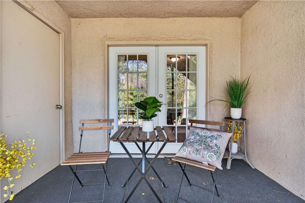 2396 Lawrenceville Highway, Unit G Decatur, GA 30033 - Photo 26 of 30 a dining room with furniture and wooden floor