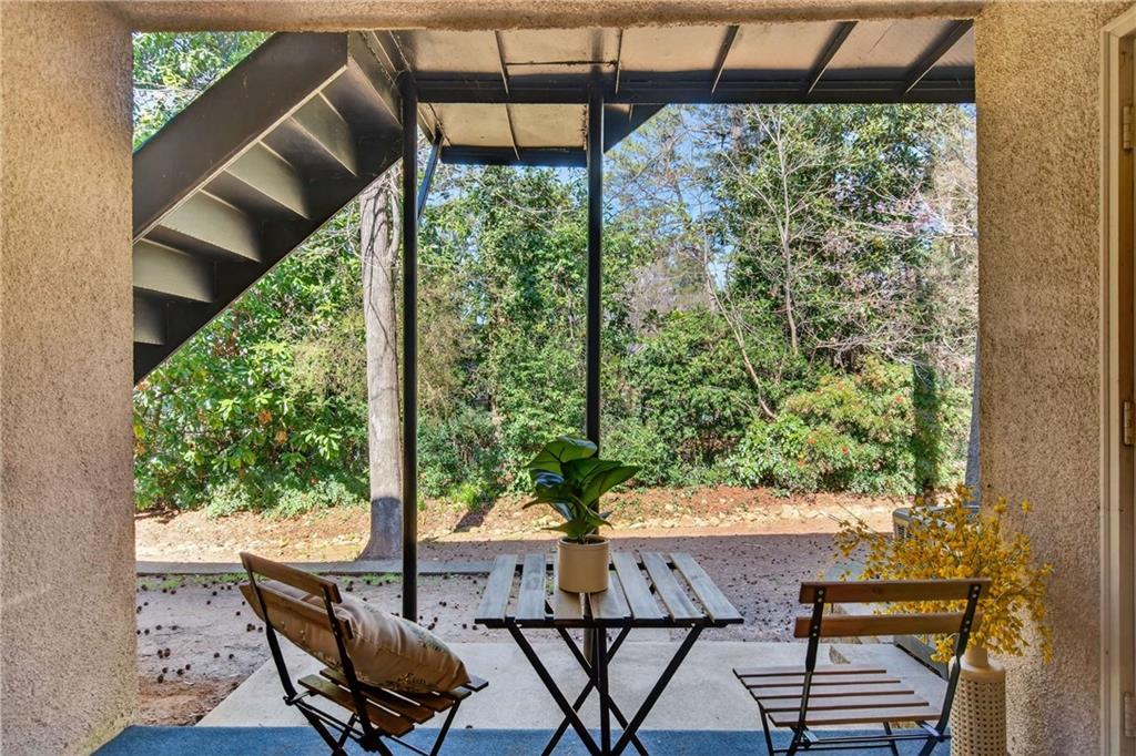 2396 Lawrenceville Highway, Unit G Decatur, GA 30033 - Photo 27 of 30 a view of a chairs and table in the patio