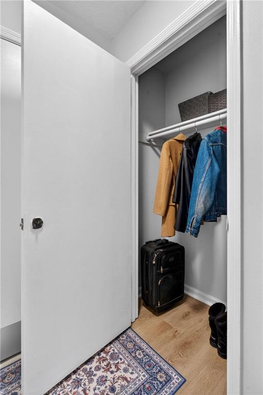 2396 Lawrenceville Highway, Unit G Decatur, GA 30033 - Photo 4 of 30 a view of walk in closet with clothes and shoes