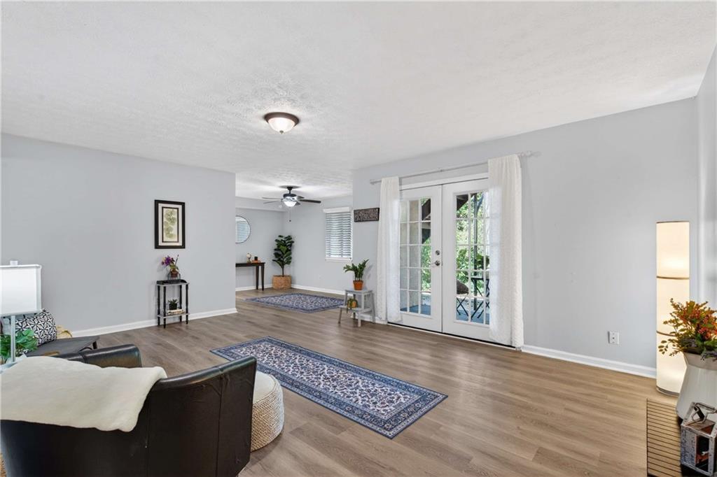 2396 Lawrenceville Highway, Unit G Decatur, GA 30033 - Photo 5 of 30 a living room with furniture and wooden floor