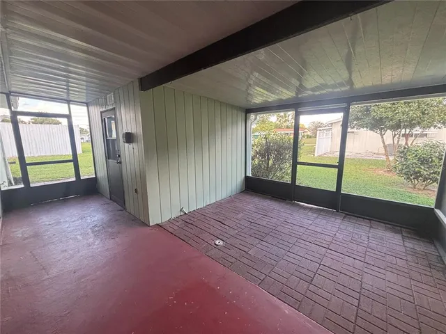 en empty room with windows