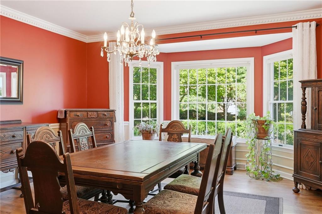 900 Settlers Ridge Road Pittsburgh, PA 15238 - Photo 20 of 50 A picturesque three-panel bay window frames views of the beautifully landscaped grounds.