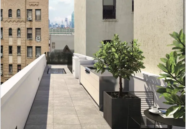 a potted plant sitting in front of a building