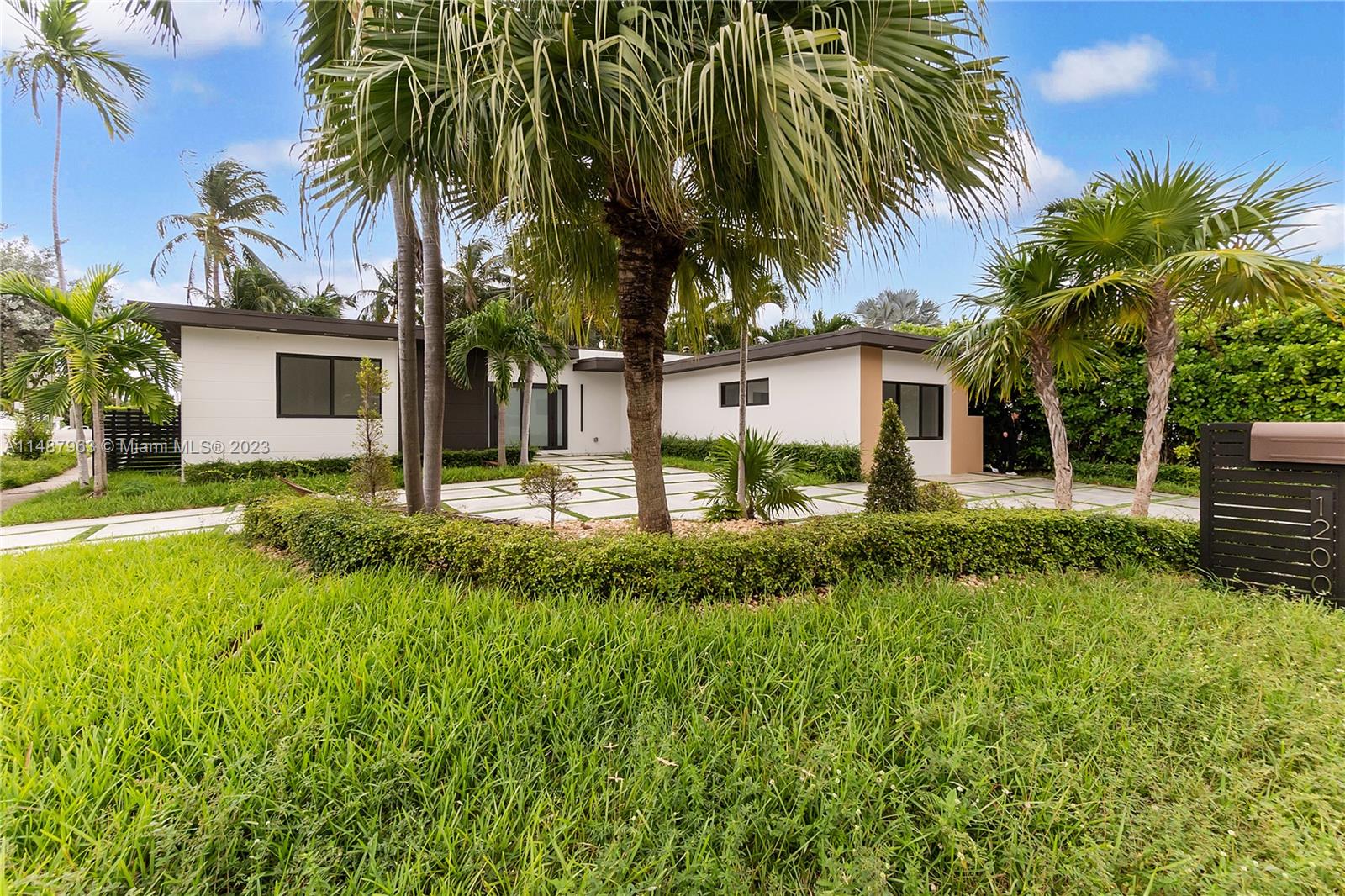 1200 Cleveland Road Miami Beach, FL 33141 - Photo 3 of 41 a front view of house with yard and green space