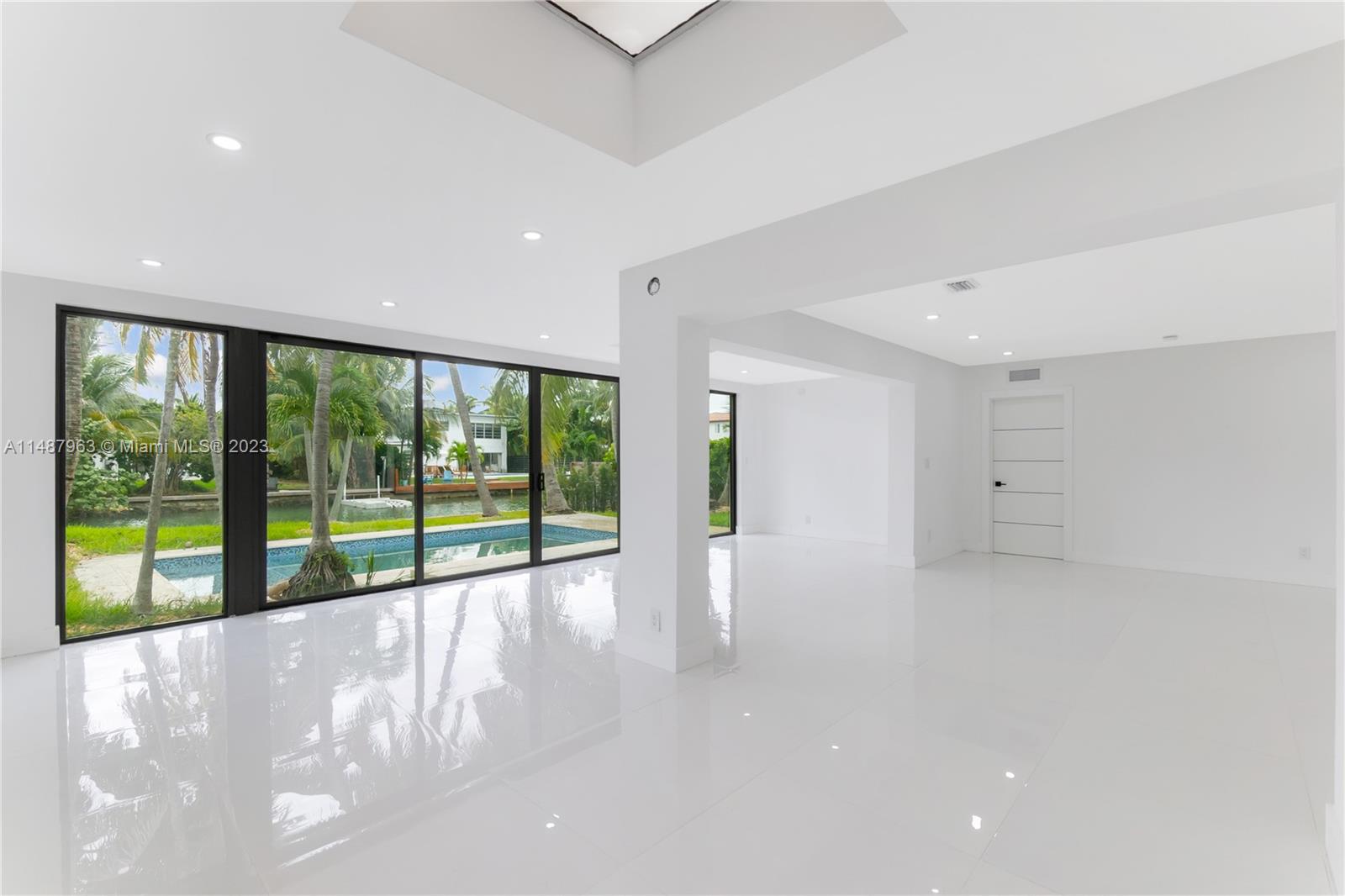 1200 Cleveland Road Miami Beach, FL 33141 - Photo 6 of 41 a view of an entryway with wooden floor