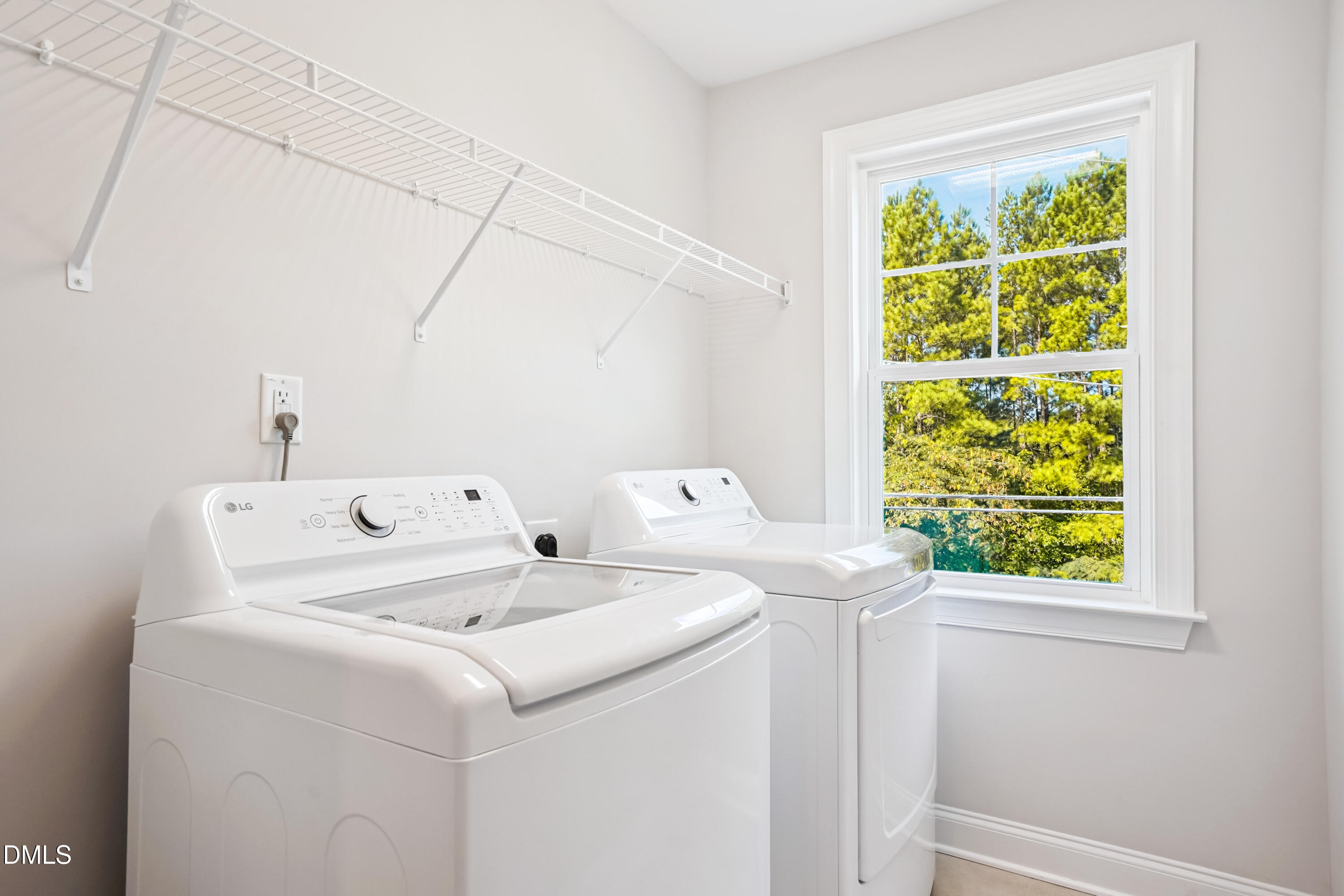 4921 Theater Way Raleigh, NC 27604 - Photo 17 of 26 a utility room with dryer and washer