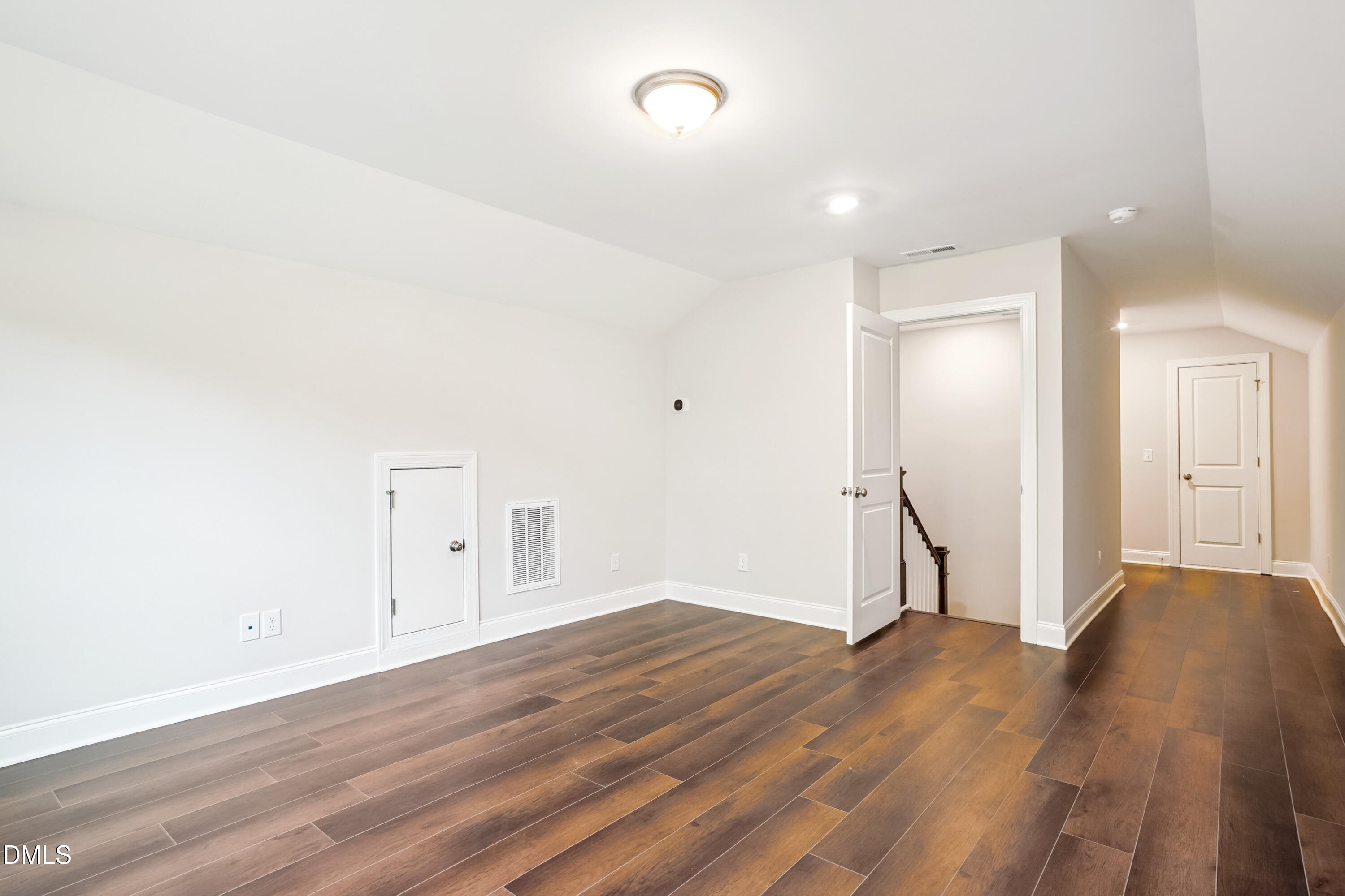 4921 Theater Way Raleigh, NC 27604 - Photo 21 of 26 a view of empty room with wooden floor