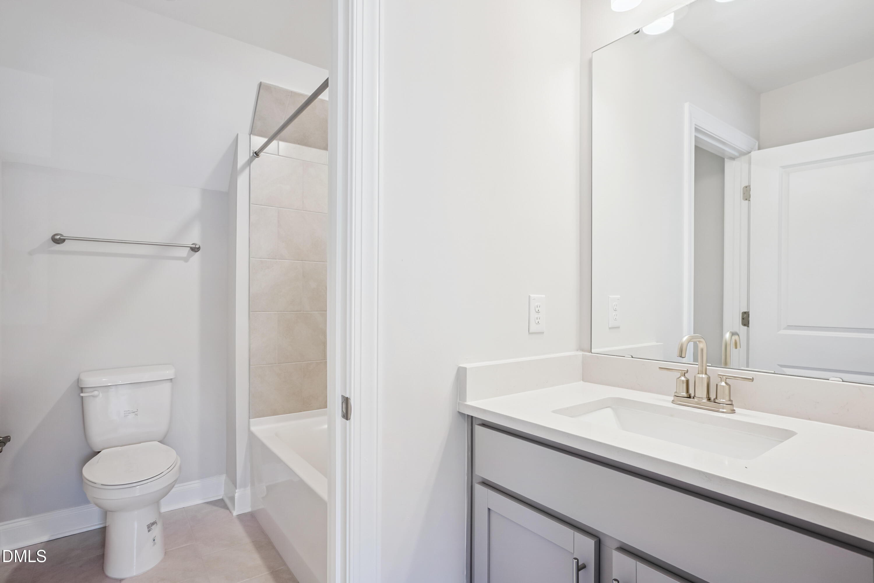 4921 Theater Way Raleigh, NC 27604 - Photo 5 of 26 a bathroom with a sink toilet and shower