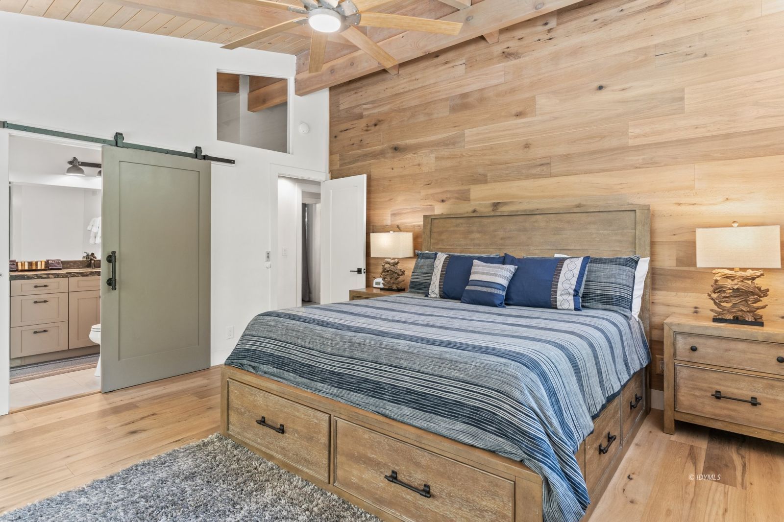 25010 Tahquitz Road Idyllwild, CA 92549 - Photo 34 of 93 a bedroom with a bed and cabinets