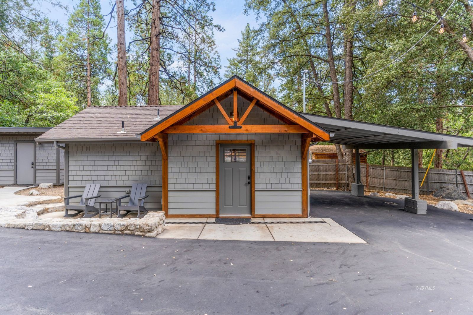 25010 Tahquitz Road Idyllwild, CA 92549 - Photo 53 of 93 a front view of a house with a yard and garage