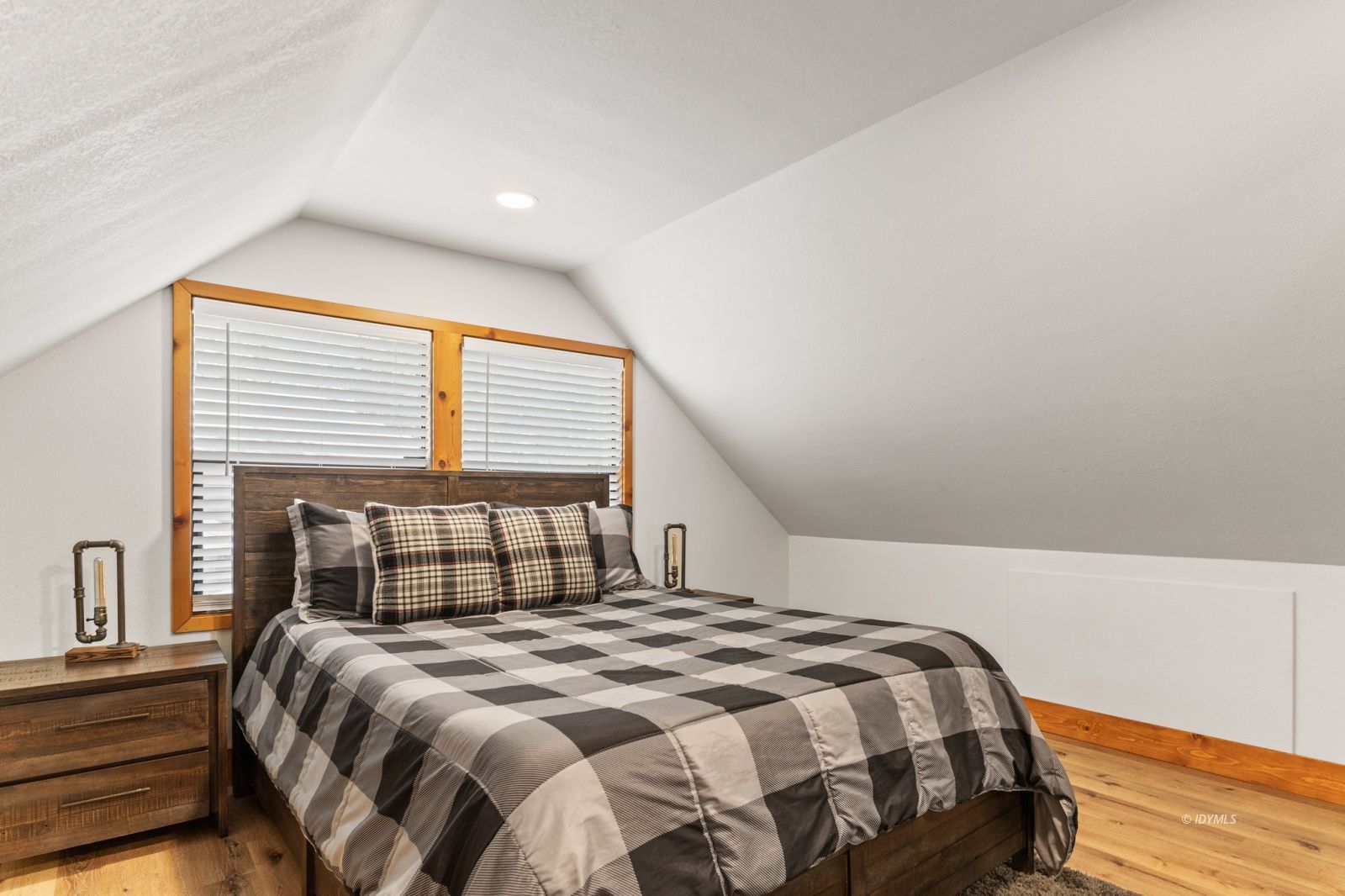 25010 Tahquitz Road Idyllwild, CA 92549 - Photo 76 of 93 a bedroom with a bed and a window