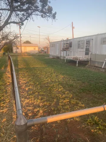 a view of a water with a big yard