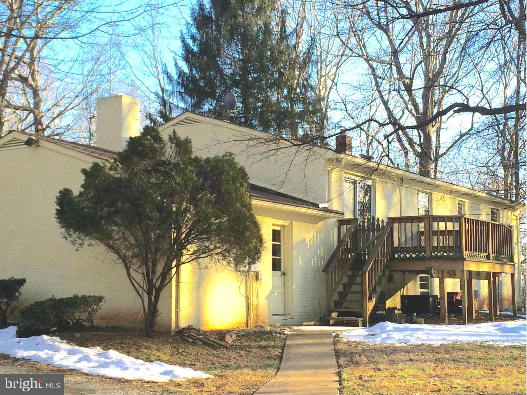 20811 Evergreen Mills Road Leesburg, VA 20175 - Photo 2 of 13 a view of a house with snow