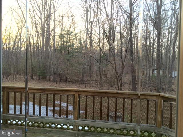 20811 Evergreen Mills Road Leesburg, VA 20175 - Photo 13 of 13 a balcony with wooden fence
