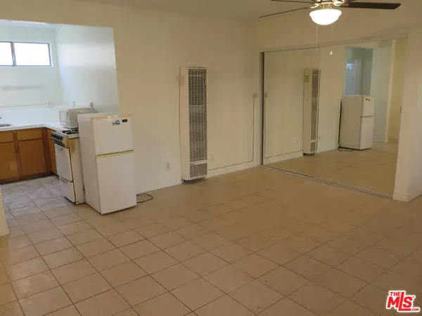 a view of a storage & utility room with a sink
