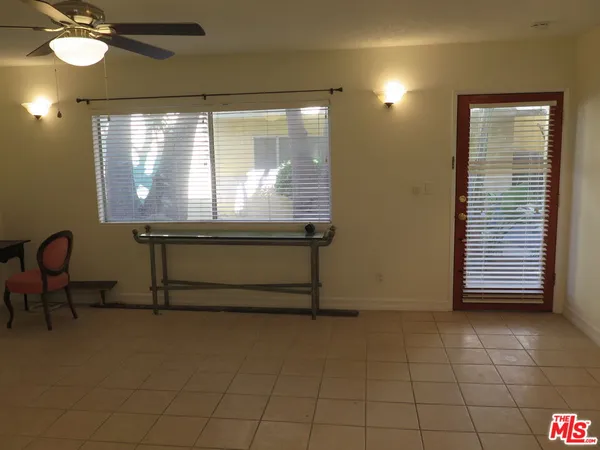 a view of a room with a large window