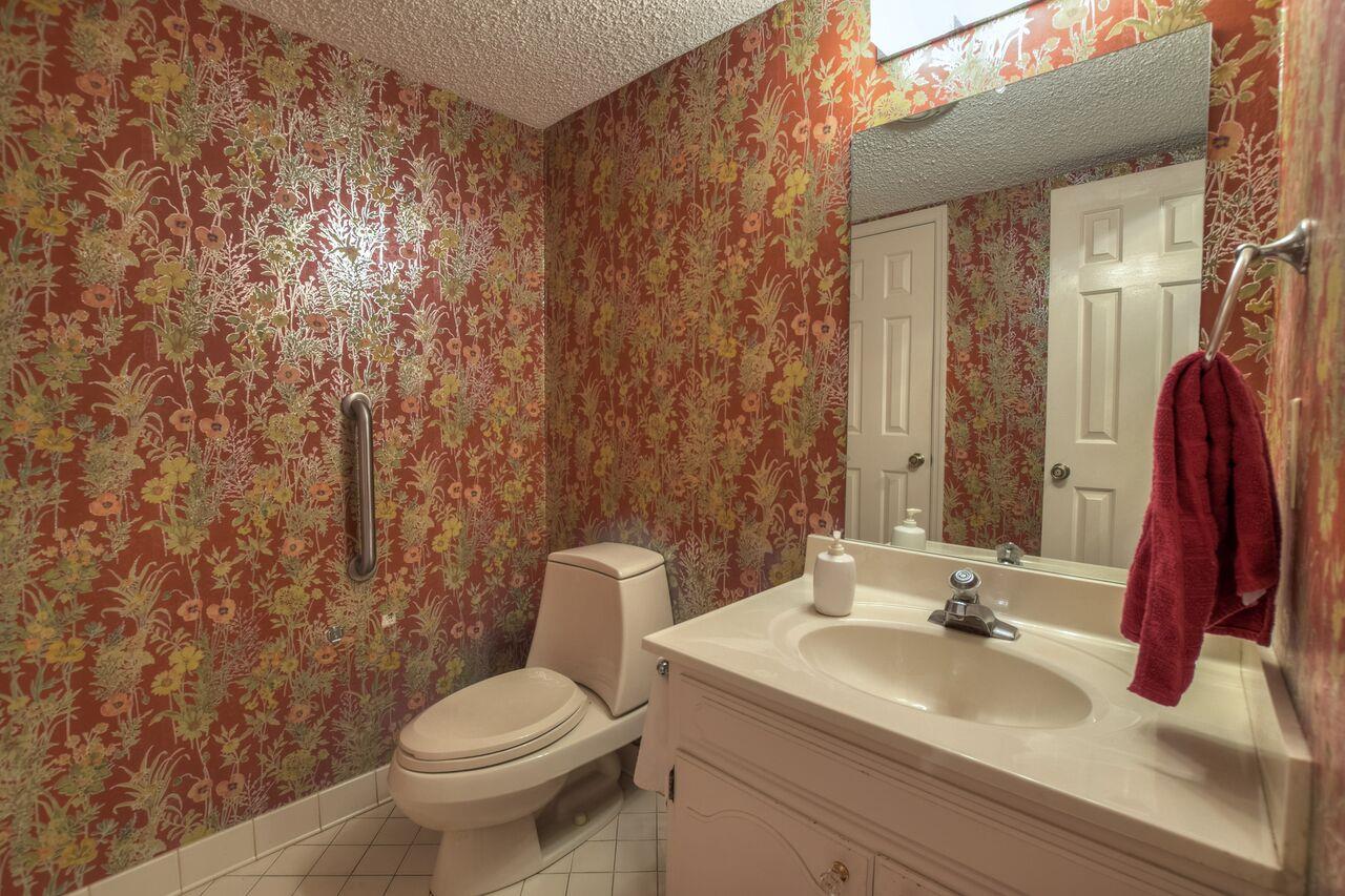 4001 Anderson Road, Unit B128 Nashville, TN 37217 - Photo 11 of 21 a bathroom with a sink and a toilet