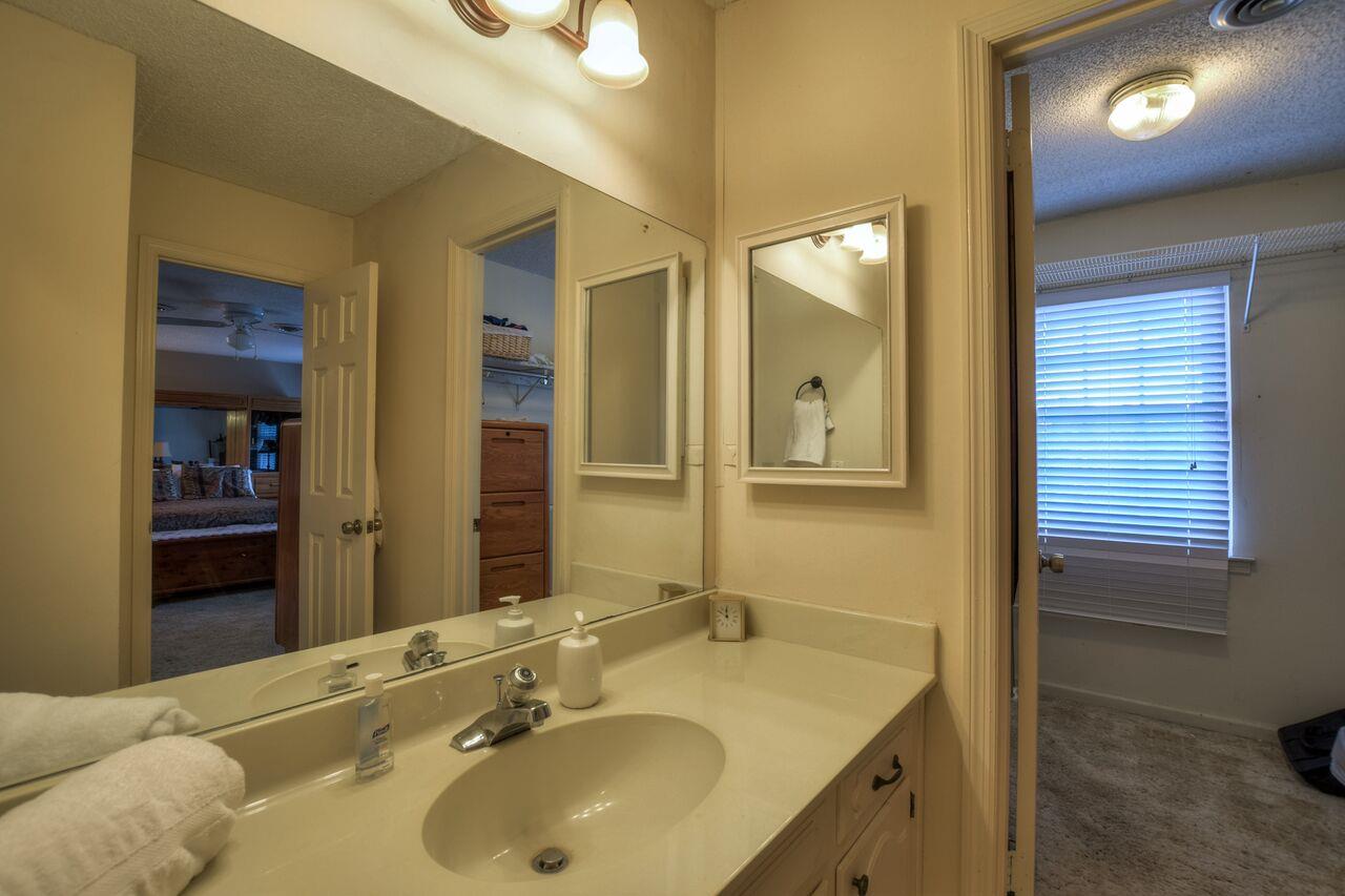 4001 Anderson Road, Unit B128 Nashville, TN 37217 - Photo 18 of 21 a bathroom with a sink and a mirror