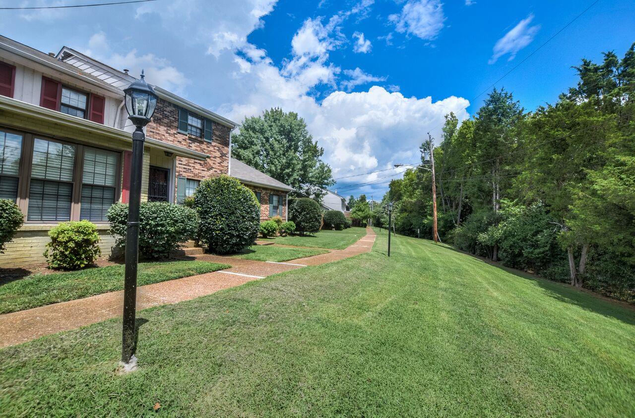 4001 Anderson Road, Unit B128 Nashville, TN 37217 - Photo 2 of 21 a house view with a garden space