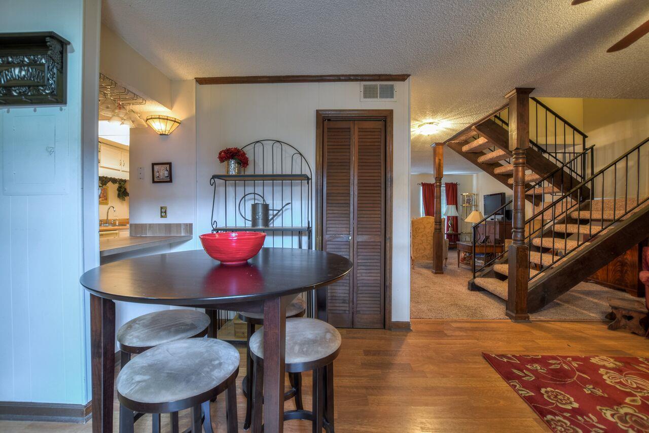 4001 Anderson Road, Unit B128 Nashville, TN 37217 - Photo 3 of 21 a view of a room with furniture and wooden floor